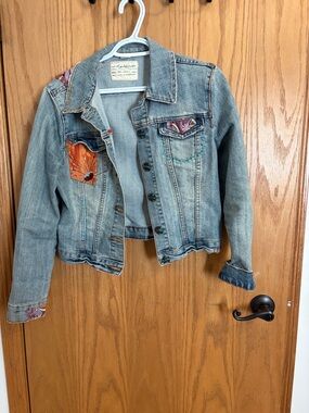 Light Wash Denim Jacket with Floral Patch Details